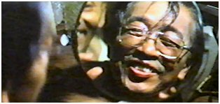 Granddad (Wong Ching Ho) receives new glasses